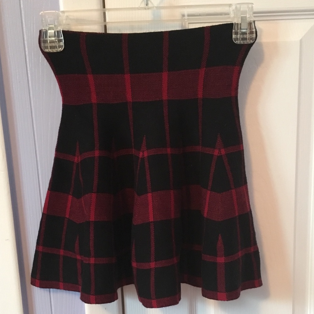 Pleated red and black skirt